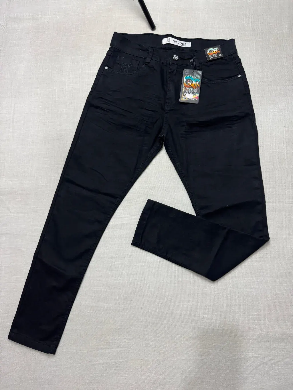 CALÇA JEANS JOGADOR QR CODE — foto 1 de 2